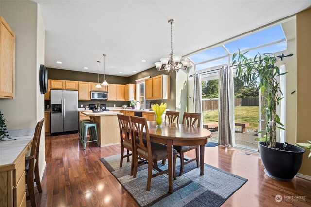 1735 SW 346th Pl, Federal Way, WA 98023 - dining space with dark hardwood / wood-style flooring, a chandelier, and sink