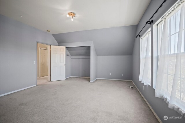 1735 SW 346th Pl, Federal Way, WA 98023 - unfurnished bedroom with light colored carpet, lofted ceiling, and a closet