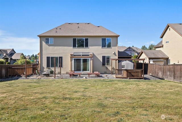 1735 SW 346th Pl, Federal Way, WA 98023 - rear view of house with a wooden deck and a lawn