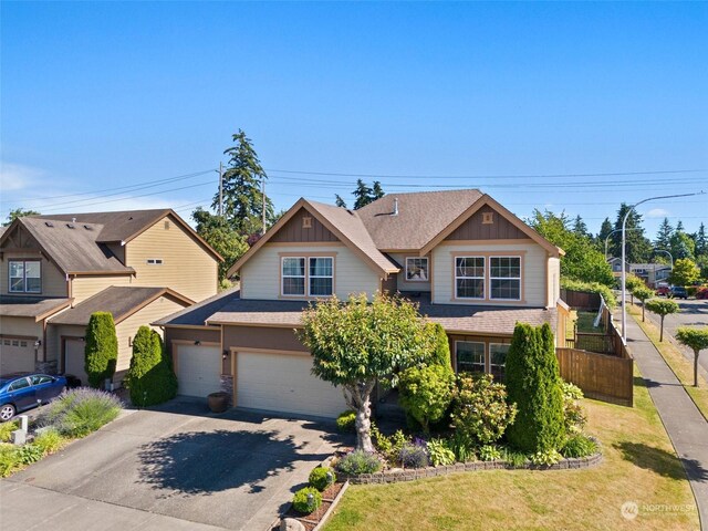 1735 SW 346th Pl, Federal Way, WA 98023 - view of front of house featuring a garage and a front lawn