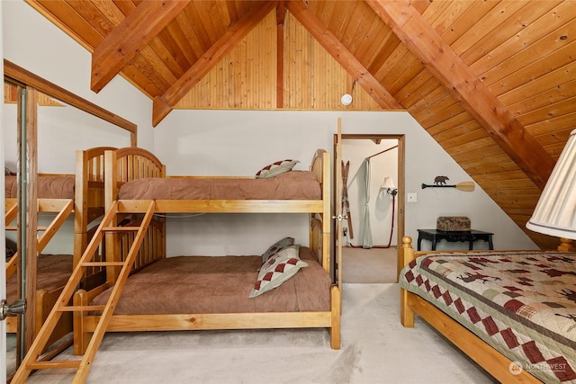 bedroom featuring light colored carpet, lofted ceiling with beams, and wooden ceiling