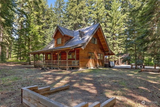 view of property exterior with a porch