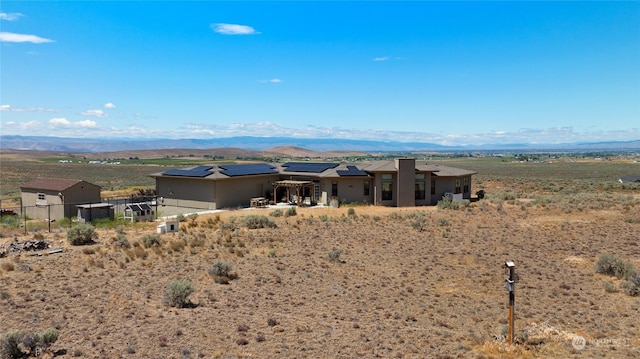 exterior space featuring a mountain view