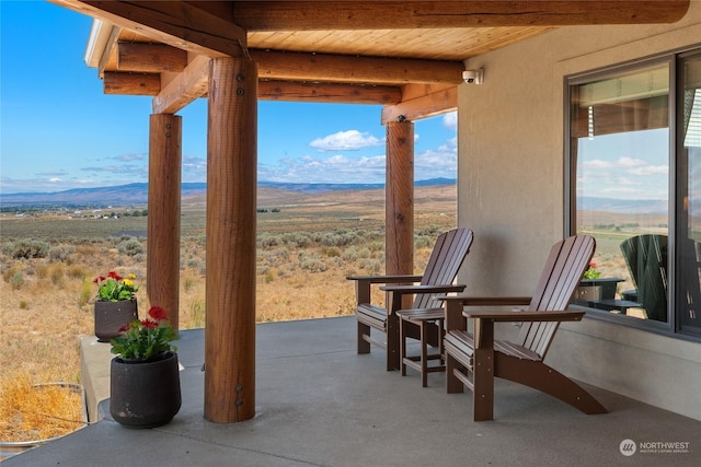 view of patio featuring a mountain view