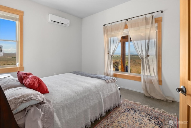 bedroom featuring carpet floors and a wall unit AC