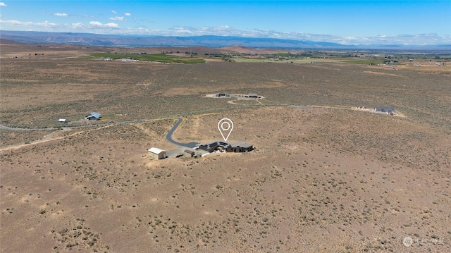 bird's eye view with a mountain view