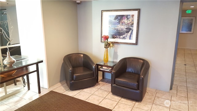 sitting room featuring light tile patterned floors