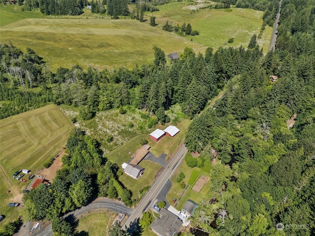 birds eye view of property featuring a rural view