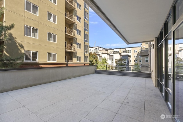 view of patio / terrace with a balcony