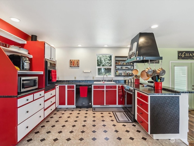 kitchen featuring island exhaust hood, sink, and black appliances