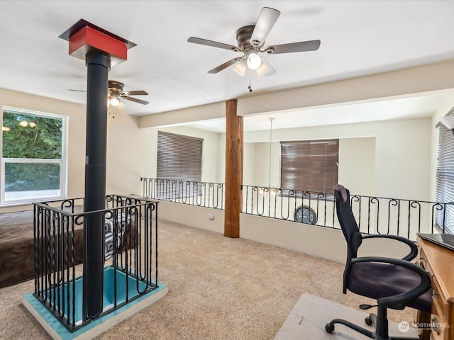 office area featuring ceiling fan and carpet floors