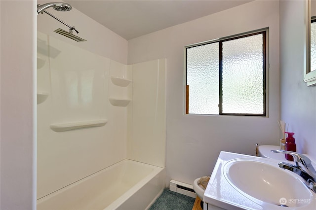 full bathroom with washtub / shower combination, tile patterned floors, toilet, vanity, and a baseboard heating unit