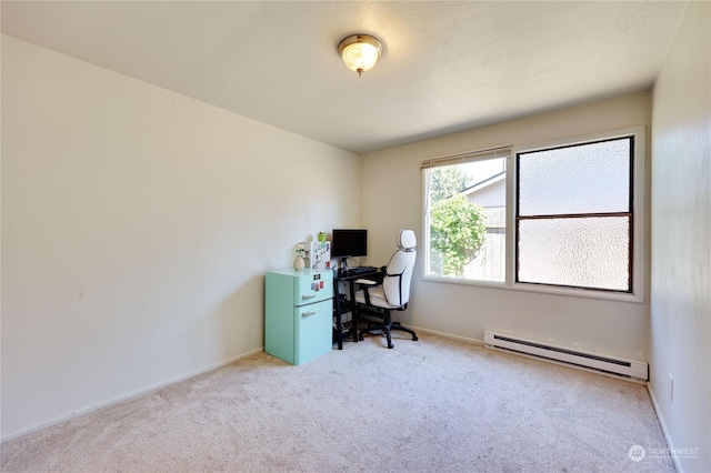 carpeted office with a baseboard heating unit