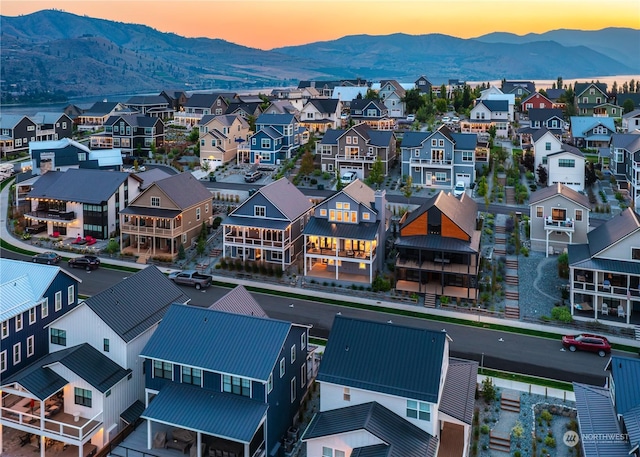 aerial view at dusk with a mountain view