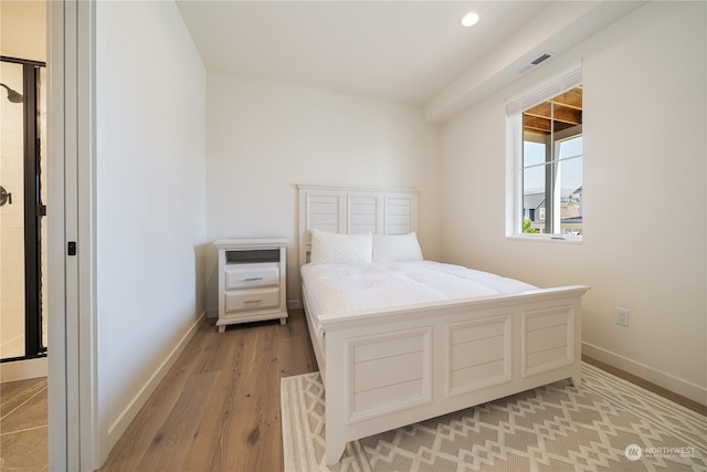 bedroom featuring light hardwood / wood-style flooring