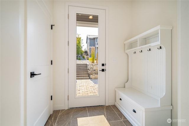 mudroom with tile patterned floors