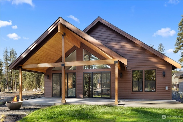 back of house with a patio