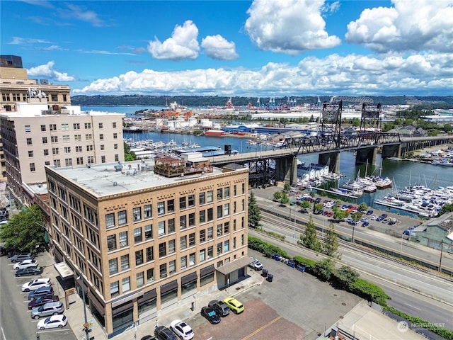 aerial view featuring a water view and a view of city