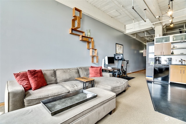 living room with concrete flooring and sink