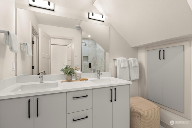 bathroom with an enclosed shower and vanity