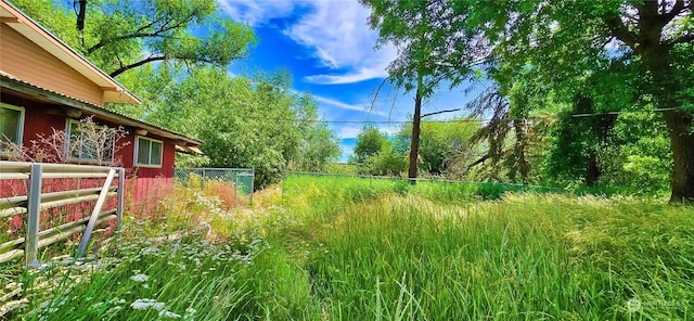 view of yard with fence