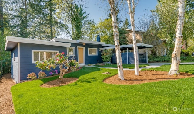 ranch-style house with a front lawn and a carport