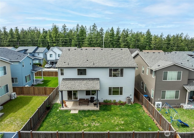 4429 Hibiscus Cir SW, Port Orchard, WA 98367 - rear view of property featuring central AC, a shingled roof, a patio area, and a residential view