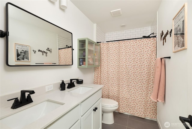 4429 Hibiscus Cir SW, Port Orchard, WA 98367 - full bathroom with tile patterned flooring, double vanity, toilet, and curtained shower