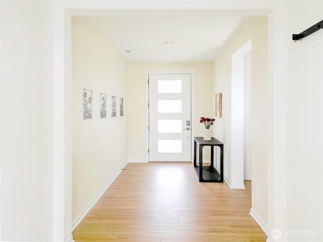 4429 Hibiscus Cir SW, Port Orchard, WA 98367 - doorway with light wood-style flooring and baseboards