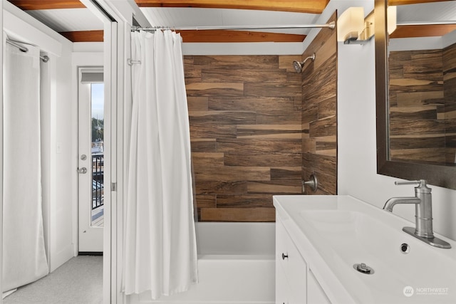 bathroom with vanity and shower / bath combo