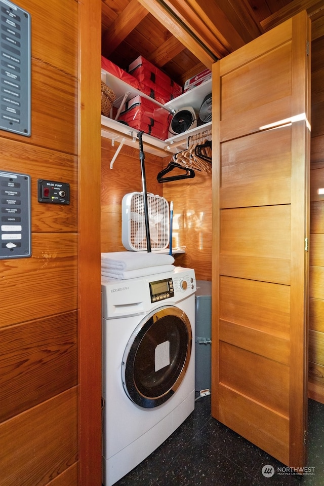 laundry room with wood walls, washer / dryer, and wood ceiling