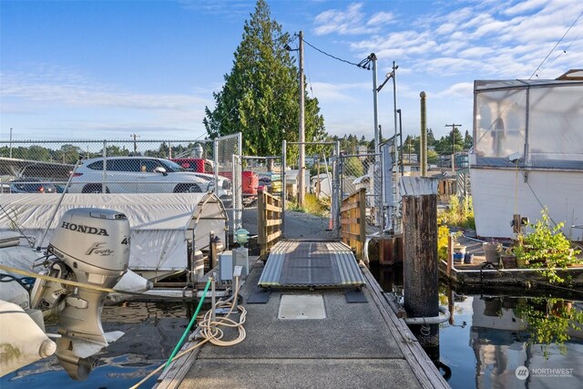 view of dock with a water view