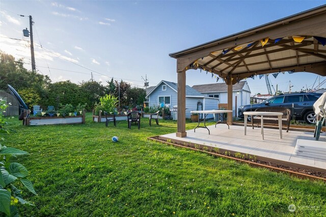 view of yard with a patio and a gazebo