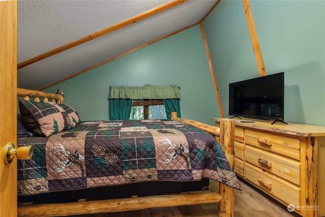 252 Snyder Rd, Packwood, WA 98361 - bedroom featuring hardwood / wood-style flooring and vaulted ceiling