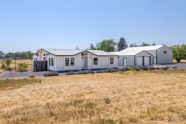 view of front of property featuring a garage