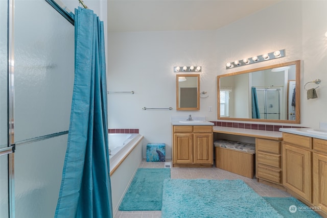 bathroom with vanity, plus walk in shower, and tile patterned floors