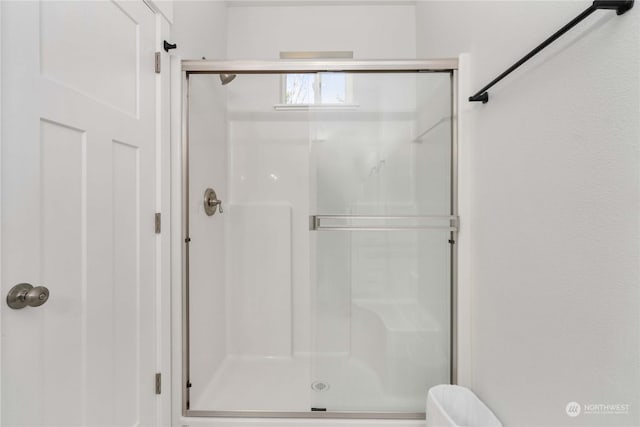 bathroom with walk in shower