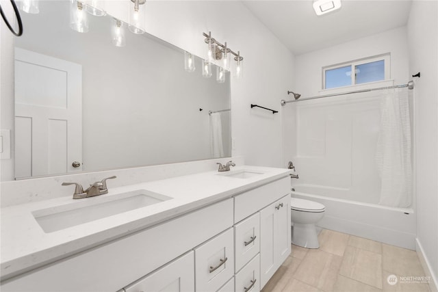 full bathroom with shower / tub combo with curtain, vanity, and toilet