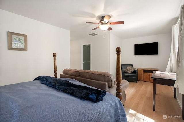 bedroom featuring light wood-type flooring and ceiling fan