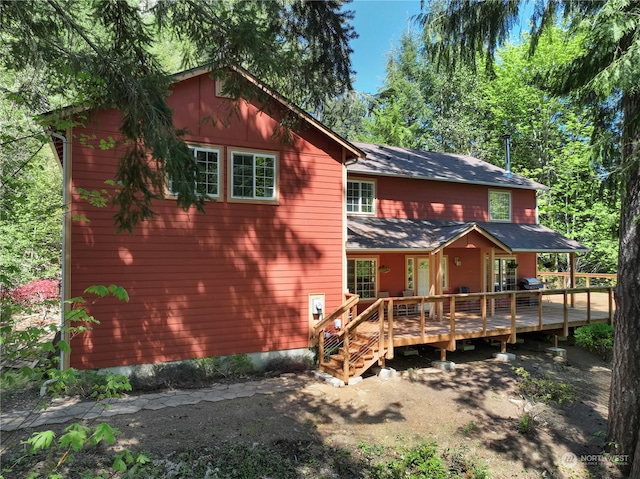 rear view of property with a deck