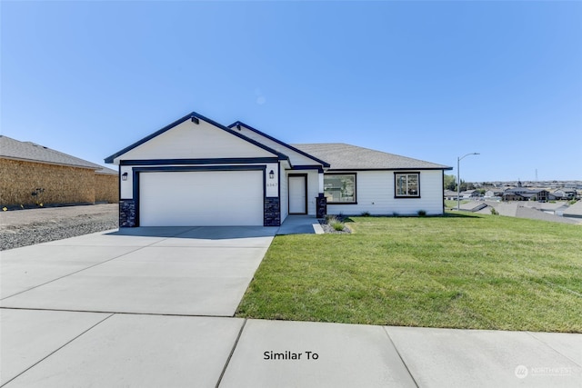 single story home featuring a front yard and a garage