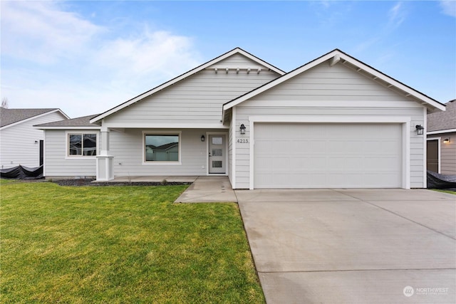 single story home featuring a garage and a front lawn