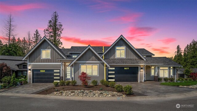 view of front of property with a garage