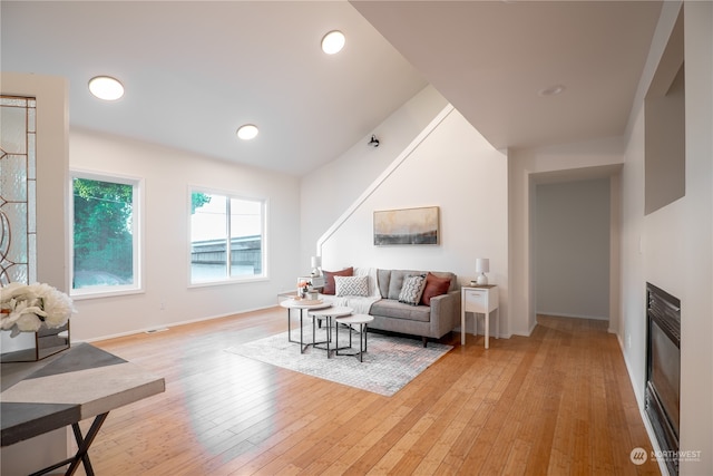 living room with light hardwood / wood-style flooring