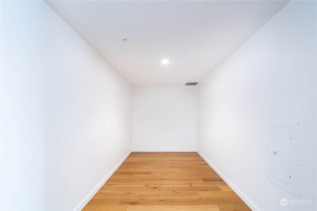 unfurnished room with light hardwood / wood-style floors