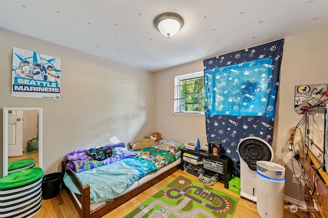 bedroom featuring light hardwood / wood-style flooring