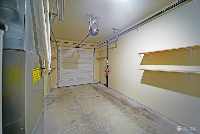 garage with a garage door opener and heating unit