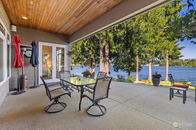 view of patio / terrace featuring a water view