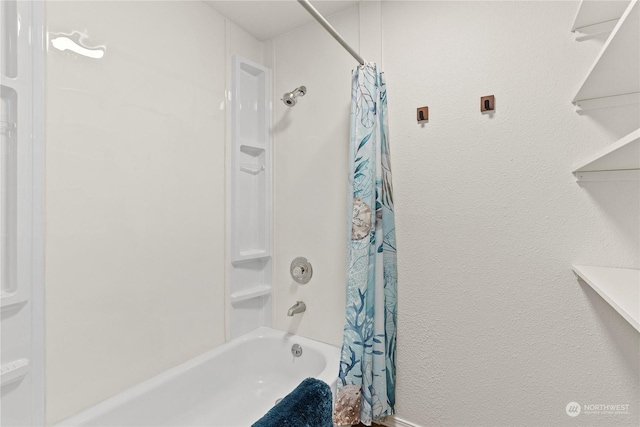 bathroom featuring shower / bath combo