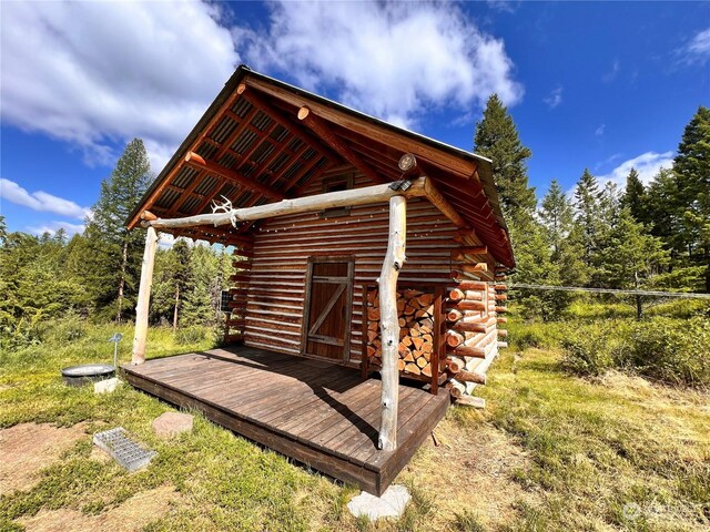 exterior space featuring an outbuilding